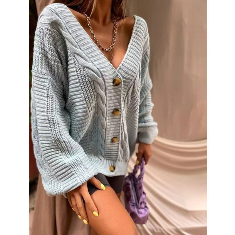 Ladies large knit cardigan with romantic cable design and large buttons Lune London