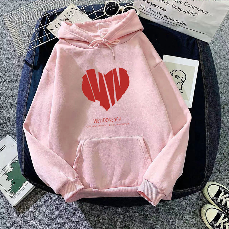 Women's hoodie with creative heart design and stylish lettering Chic & Stil