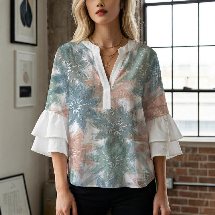 Ladies elegant top with voluminous ruffle hems and floral design Lune London