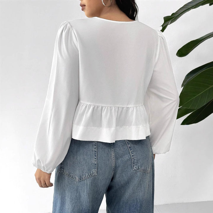 Women’s blouse with romantic ruffle details and a bow Lune London