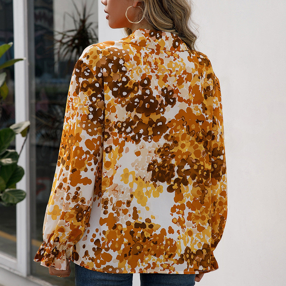 Elegant women's blouse with floral pattern and wide sleeves Lune London