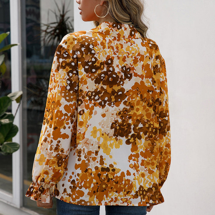 Elegant women's blouse with floral pattern and wide sleeves Lune London