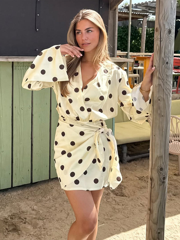 Ladies wrap mini dress with V-neck, bell sleeves and polka dot print Amarae