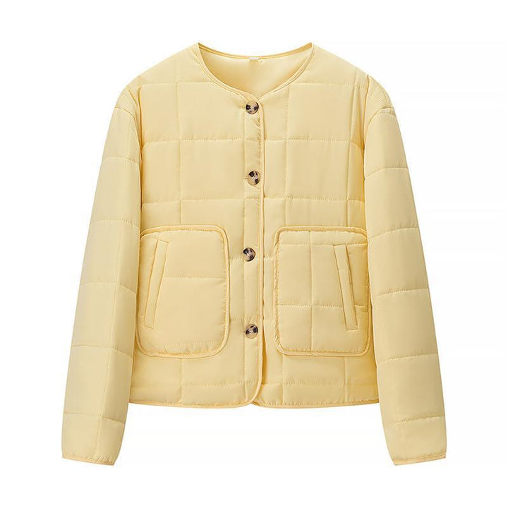 Quilted women's jacket with large applied pockets and elegant button closure system Lune London