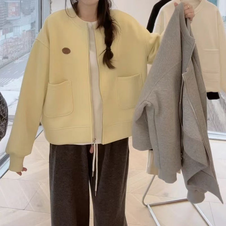 Women's oversized sweat jacket with practical pockets and fashionable design Chic & Stil