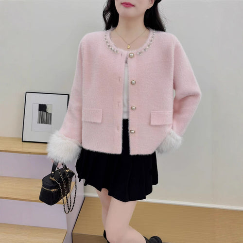 Cardigan élégant pour femmes avec décoration de perles et manches duveteuses Chic & Stil