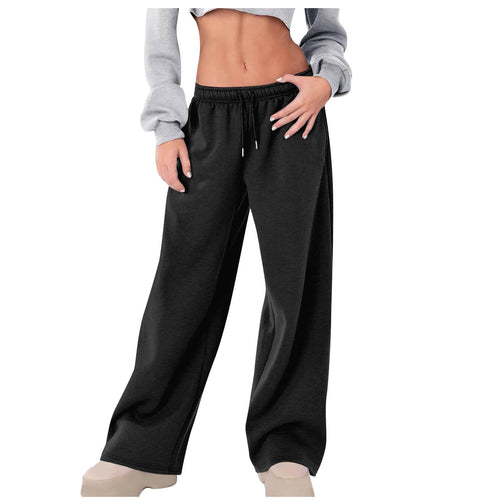 Women's loose casual pants with elastic waistband and side pockets Chic & Stil