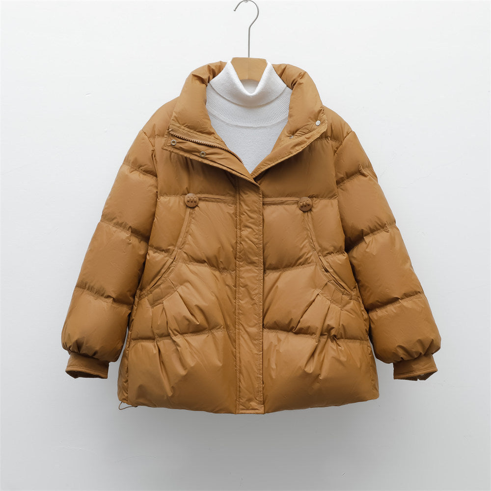 Bulky winter jacket for women with practical pockets and high collar Lune London