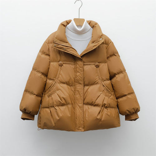 Bulky winter jacket for women with practical pockets and high collar Amarae