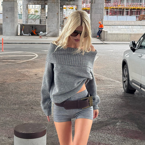 Oversized knitted sweater for women with delicate shoulder design and chic sporty shorts