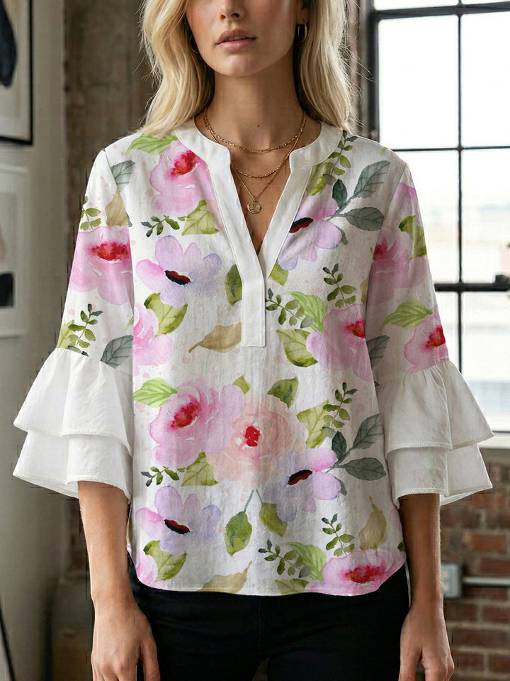 Ladies elegant blouse shirt with voluminous puff sleeves and graphic floral design Lune London