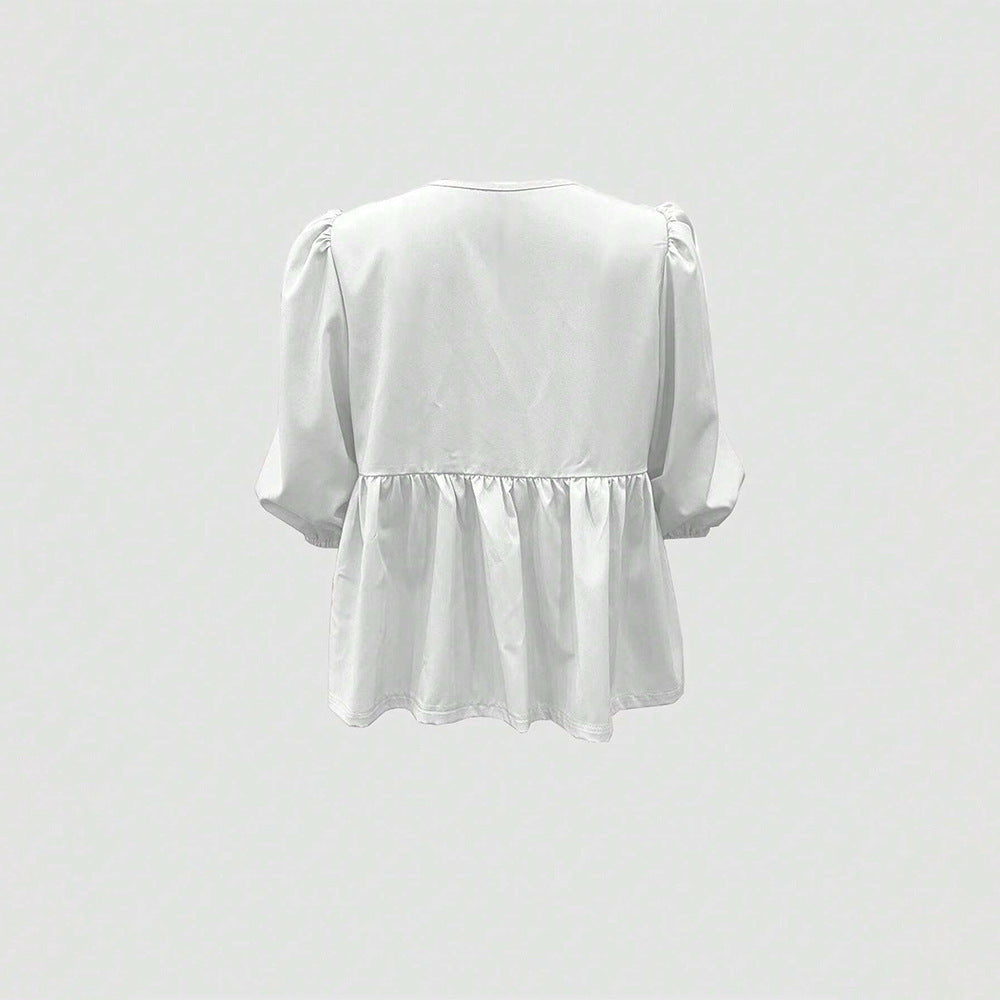 Blouse femme avec des détails de volants ludiques et une coupe décontractée Chic & Stil