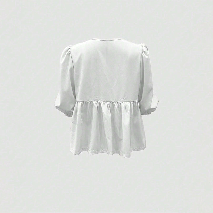 Blouse femme avec des détails de volants ludiques et une coupe décontractée Chic & Stil