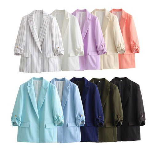 Elegant blazer jacket for women with structured sleeves and discreet golden accents Amarae
