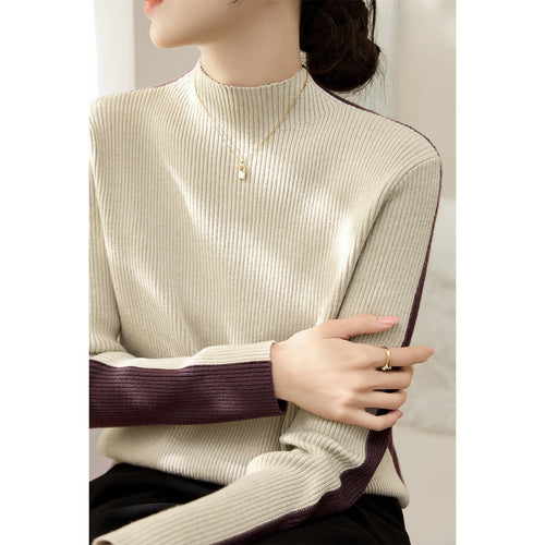Pull à col roulé tendance pour femmes avec design en côtes texturées et manches contrastantes Chic & Stil