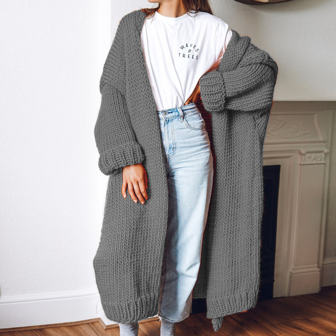 Women Large knitted coat with deep pockets and voluminous sleeves Lune London
