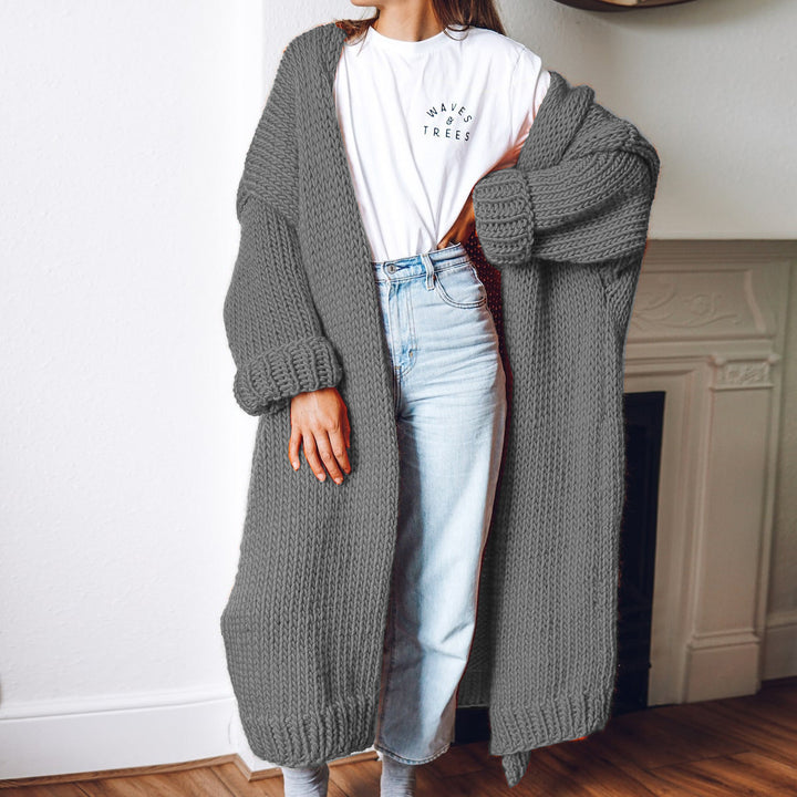 Women Large knitted coat with deep pockets and voluminous sleeves Lune London