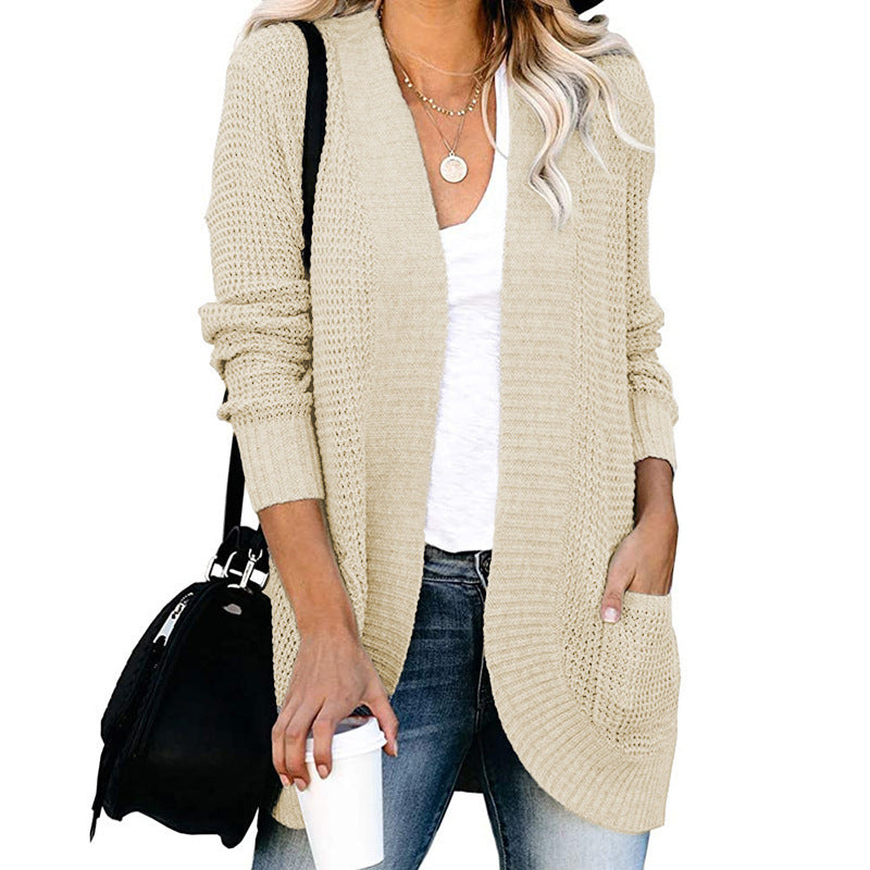 Women's knitted jacket with a loose fit and practical pockets Lune London