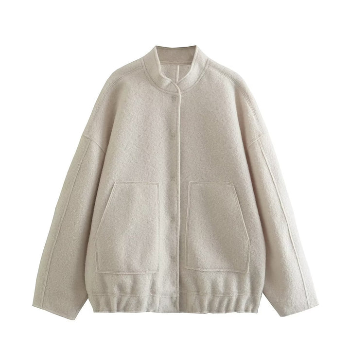Ladies oversized fluffy coat with practical pockets and an elegant high collar Lune London