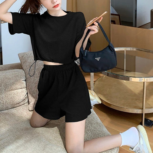 Ladies leisure set with cropped top and shorts in casual style