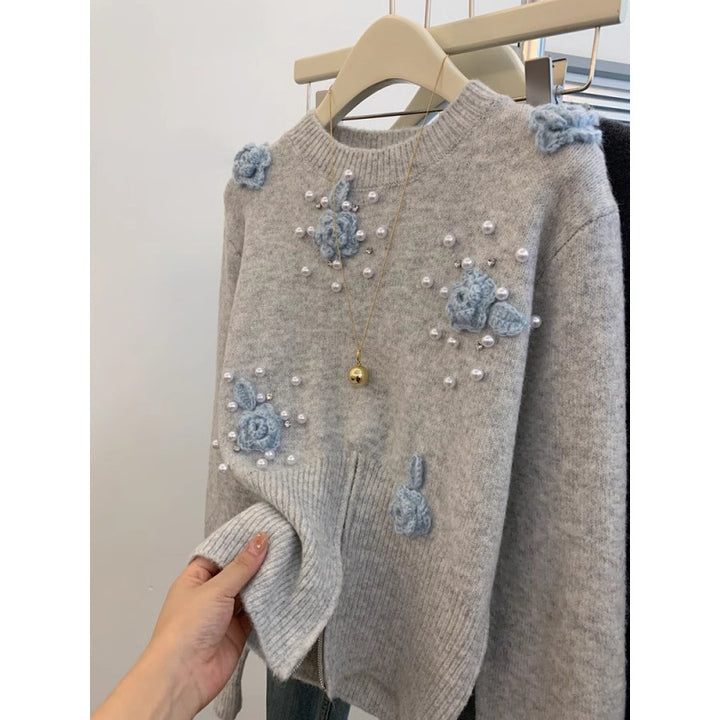 Sweater stylé pour femmes avec des applications florales Chic & Stil