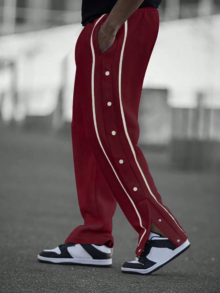 Stylish men's sports pants with snap button details and side pockets Lune London
