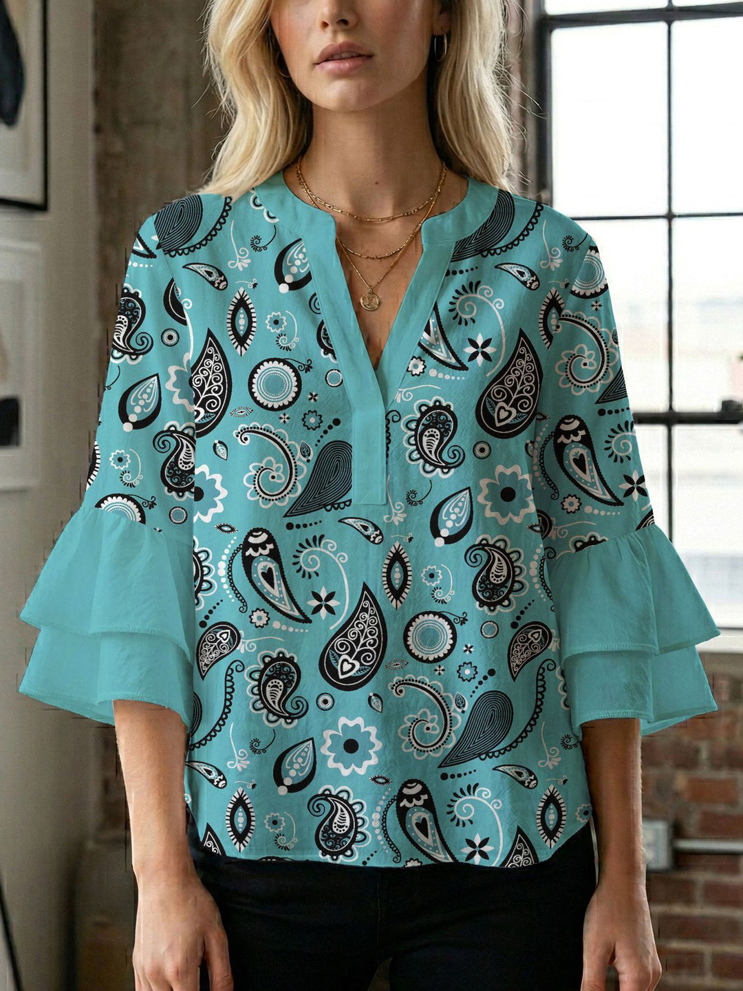 Women's blouse with voluminous wing sleeves and intense leaf pattern Lune London