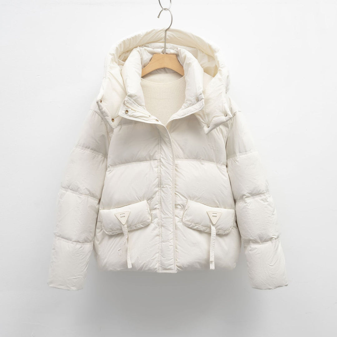 Ladies insulated quilted jacket with practical pockets and hood Lune London