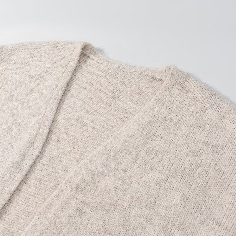 Manteau en tricot doux pour femmes à coupe large et détails élégants Chic & Stil
