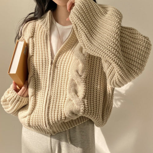 Cardigan confortable pour femme avec des manches volumineuses et un design moderne Chic & Stil