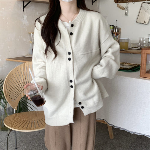 Ladies casual knitted cardigan with a fine texture and practical button details Amarae