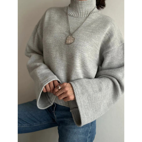 Pull en maille épaisse pour femme avec col montant et manches volumineuses Chic & Stil