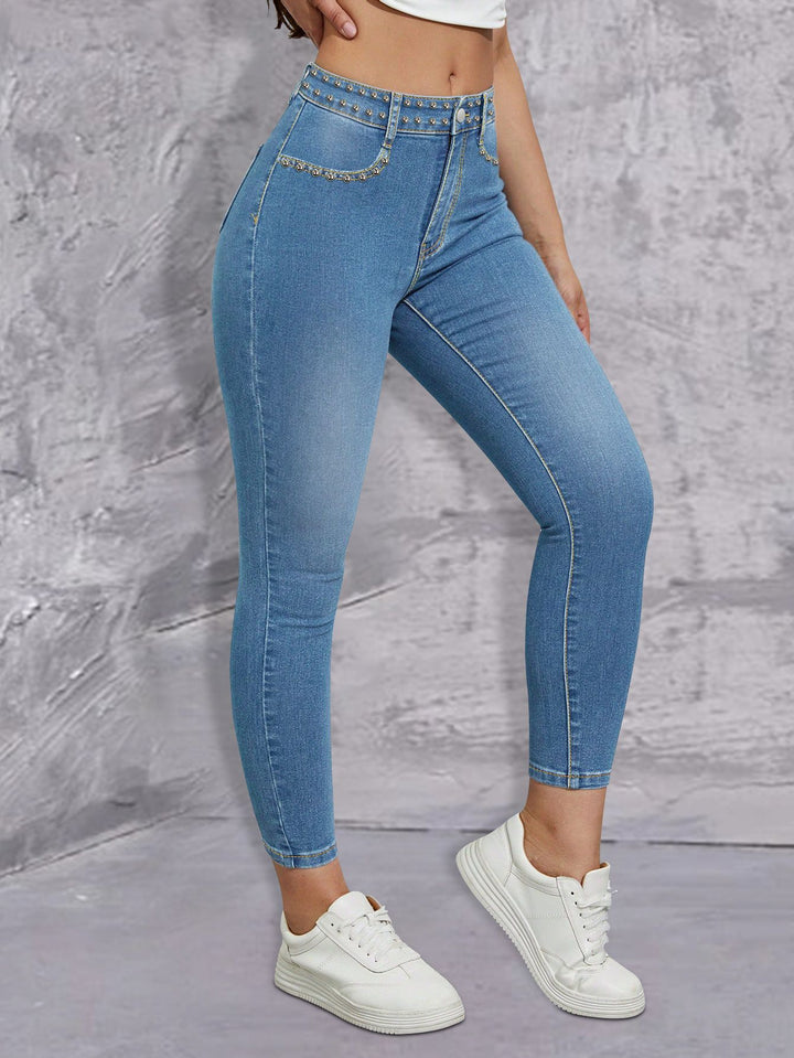 Ladies high-waisted skinny jeans with rhinestone embellishments and ankle-length cut Amarae