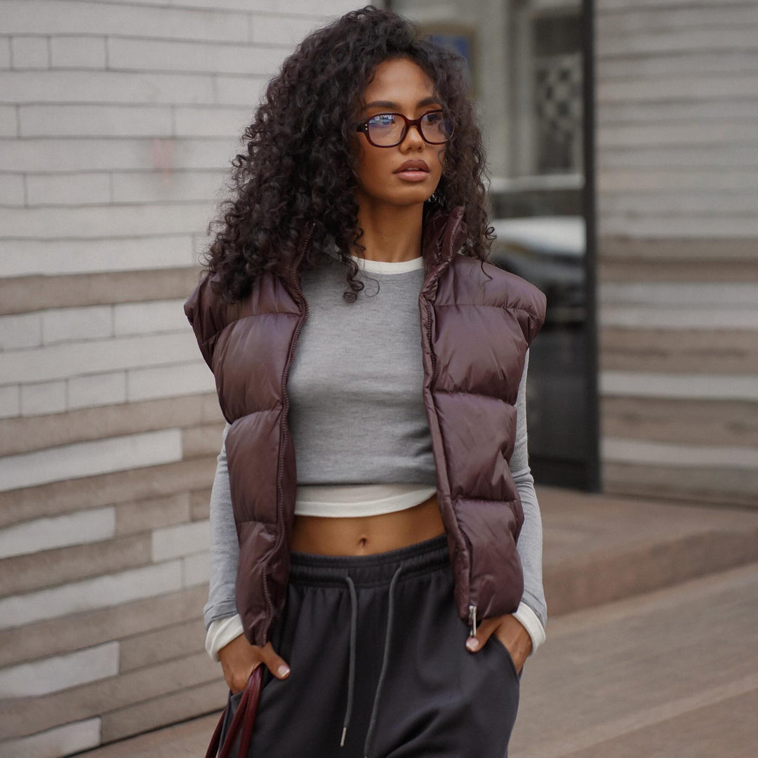 Quilted women's vest with high collar and practical zipper Amarae