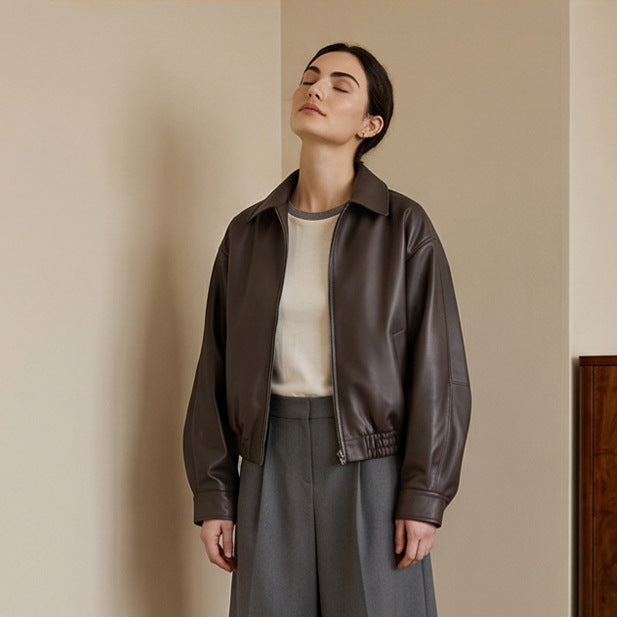 Women Boxy Cropped Faux Leather Jacket with Concealed Zipper and Elastic Hem Amarae