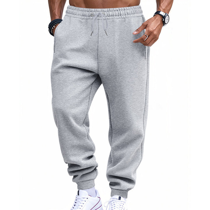 Comfortable sports pants for men with elastic waistband and practical side pockets Lune London