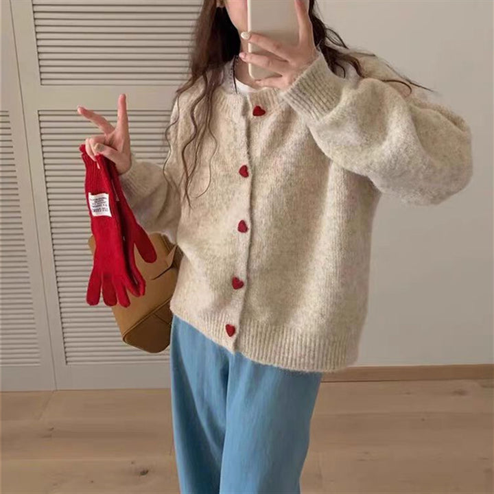 Ladies soft knit pullover with heart-shaped buttons Lune London