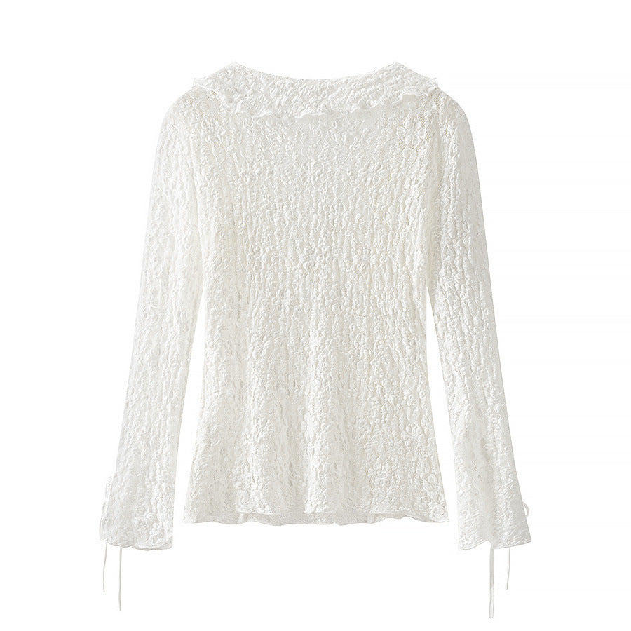 Ladies figure-hugging lace blouse with ruffle V-neck and tie detail Amarae