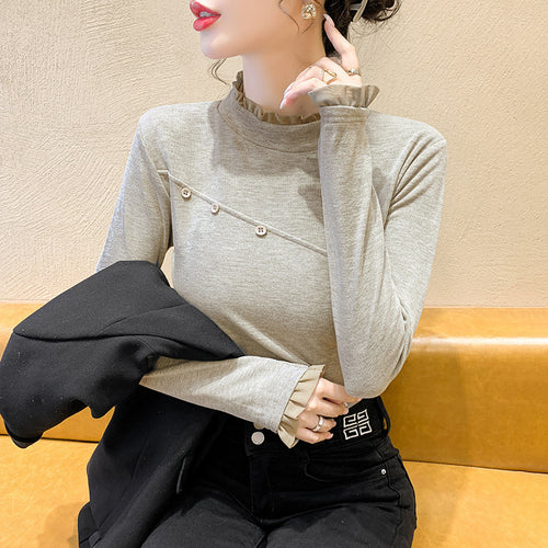 Women's long sleeve shirt with decorative button details and ruching Chic & Stil