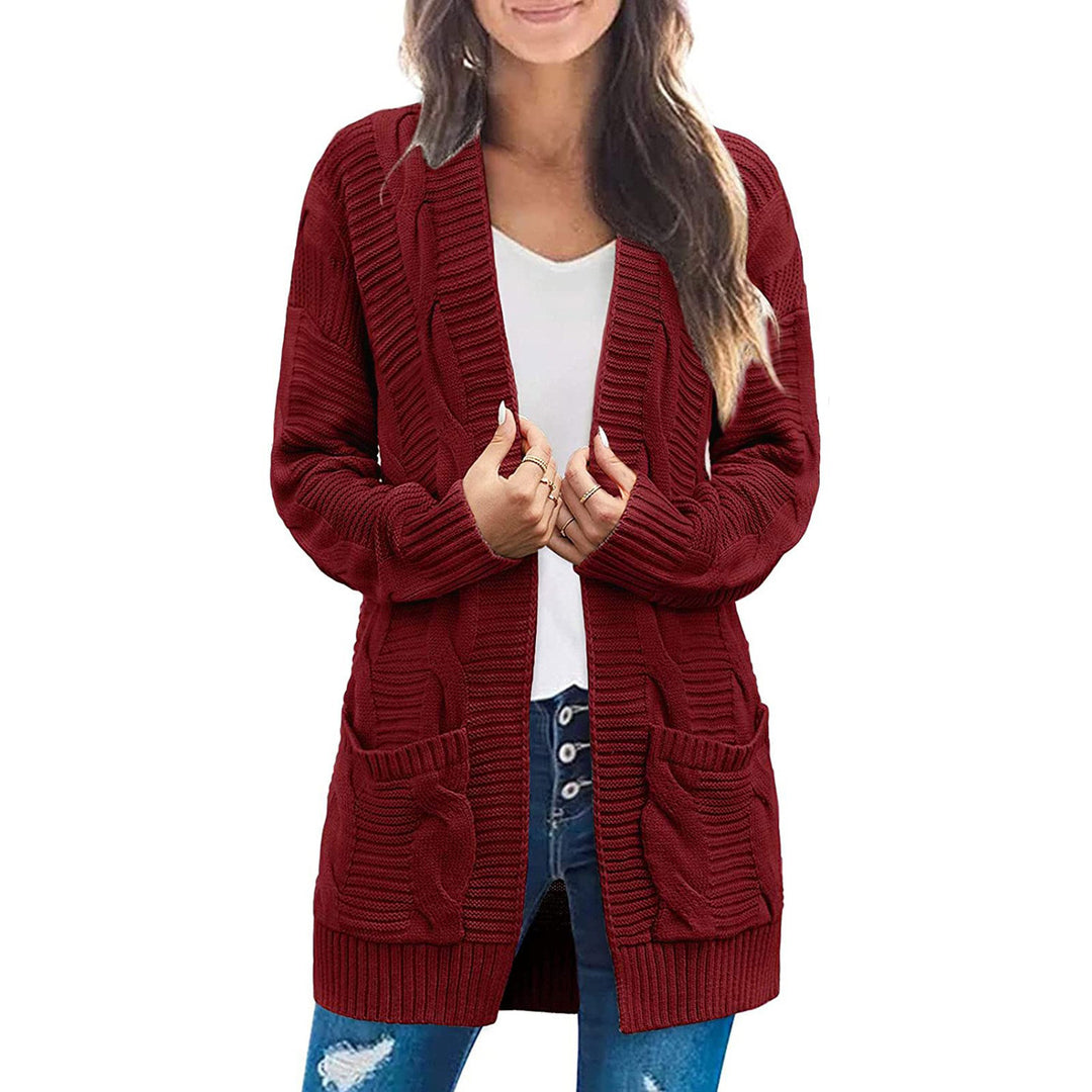 Ladies thick knit cardigan with large pockets and structured pattern Lune Londonl