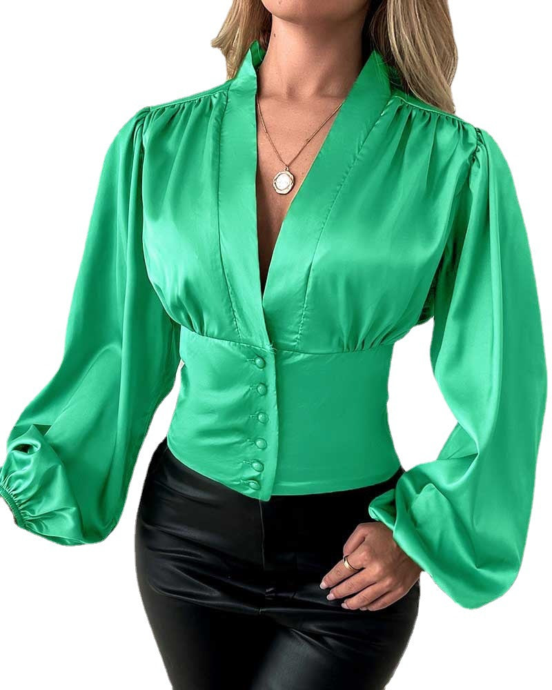 Blouse féminine avec décolleté en V profond et manches bouffantes Chic & Stil