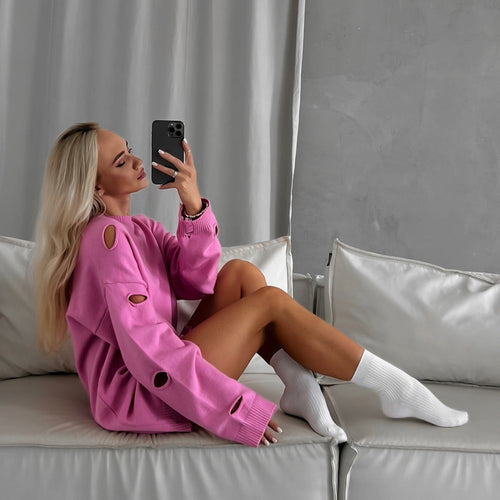 Oversized sweatshirt for ladies with stylish distressed details and a loose fit Amarae