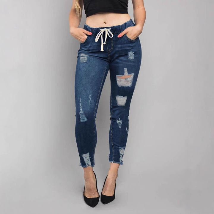 Women High-Waisted Destroyed Jogger Jeans with Elastic Drawstring Waistband and Cropped Frayed Hem Amarae
