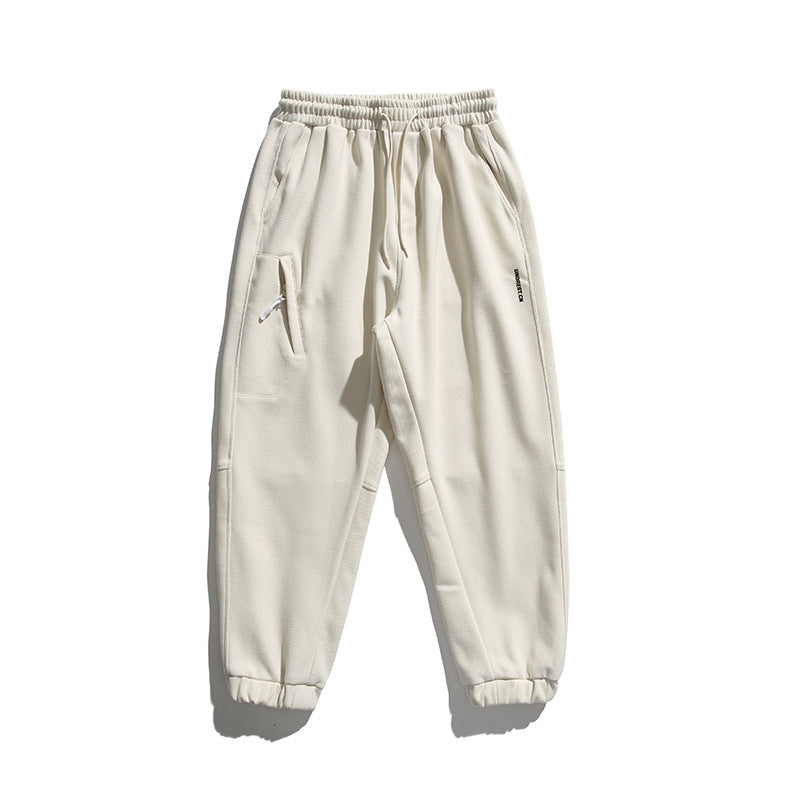 Unisex wide jogging pants in oversized cut with elastic waistband, knee panel and ribbed cuffs Amarae