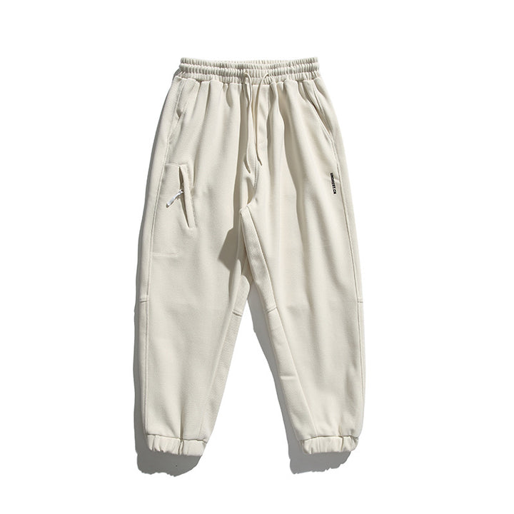 Unisex wide jogging pants in oversized cut with elastic waistband, knee panel and ribbed cuffs Amarae