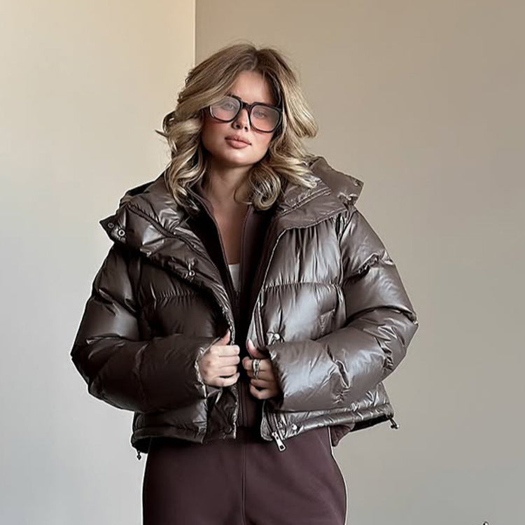 Women's short-cut shiny quilted jacket with high stand-up collar and snap-button placket Amarae