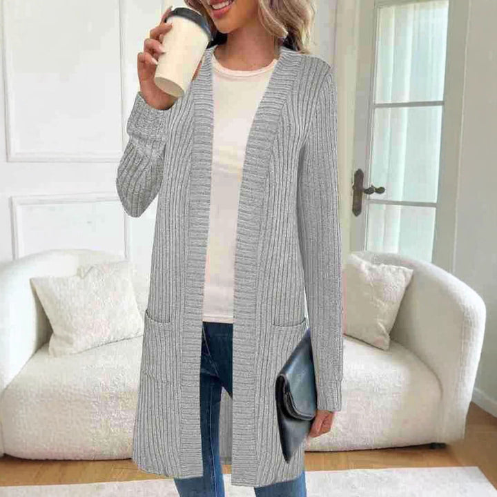 Long knitted jacket for women with side pockets and textured design Lune London