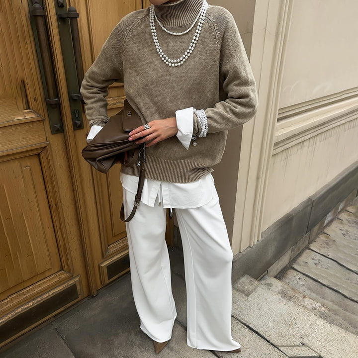 Ladies comfortable knitted sweater with high collar and elegant sleeve cuffs Lune London