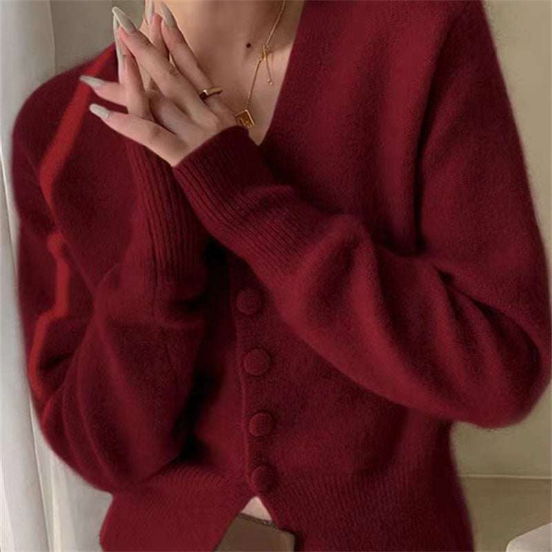 Cardigan en maille confortable pour femmes avec décolleté en V et détails de boutons Chic & Stil
