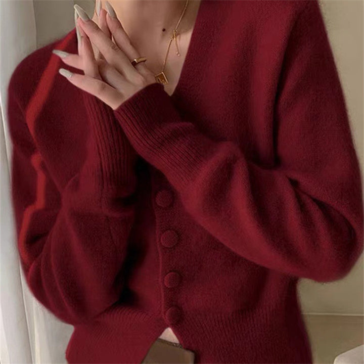 Cardigan en maille confortable pour femmes avec décolleté en V et détails de boutons Chic & Stil